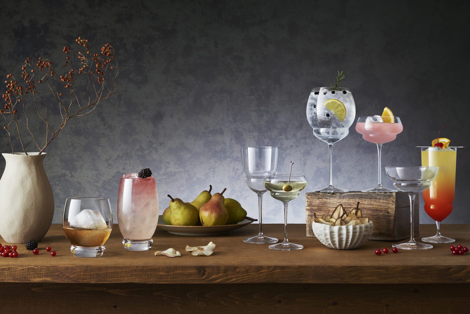 Cocktail glassware distributed by Chafic Boulos et Fils in a speakeasy setting